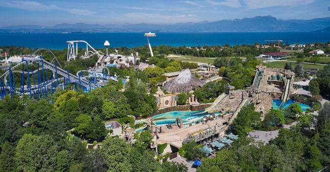 Panorama of Lake Garda, Italy. Aerial view of an amusement park, Lake Garda Italy. Amusement park Gardaland, Italy. Extreme entertainment garda. Panorama at high altitude. Berg - stock.adobe.com