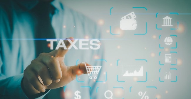 Tax payment  concept. Businessman touching tax  financial virtual button.payment by corporations such as VAT, income tax.