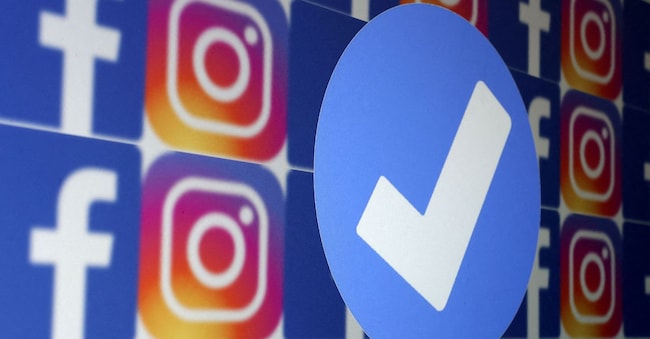 FILE PHOTO: A blue verification badge and the logos of Facebook and Instagram are seen in this picture illustration taken January 19, 2023. REUTERS/Dado Ruvic/Illustration/File Photo REUTERS