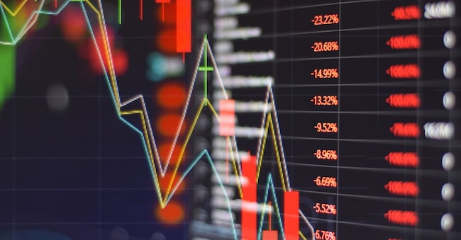 Red stock market graph be in the red on monitor chart investment be in the red trading stock exchange trading market screen at night time for background. jes2uphoto - stock.adobe.com