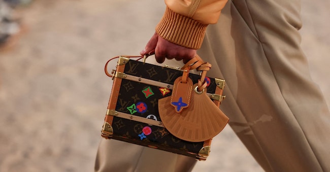 FILE PHOTO: A model presents a creation by designer and musician Pharrell Williams as part of his Menswear Spring-Summer 2027 collection show for fashion house Louis Vuitton during Men's Fashion Week in Paris, France, June 23, 2026. REUTERS/Gonzalo Fuentes/File Photo REUTERS