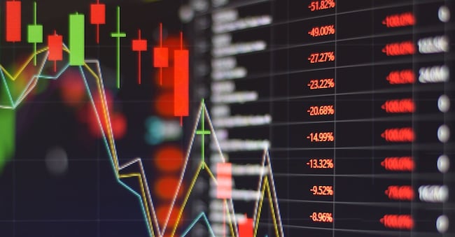 Red stock market graph be in the red on monitor chart investment be in the red trading stock exchange trading market screen at night time for background. jes2uphoto - stock.adobe.com