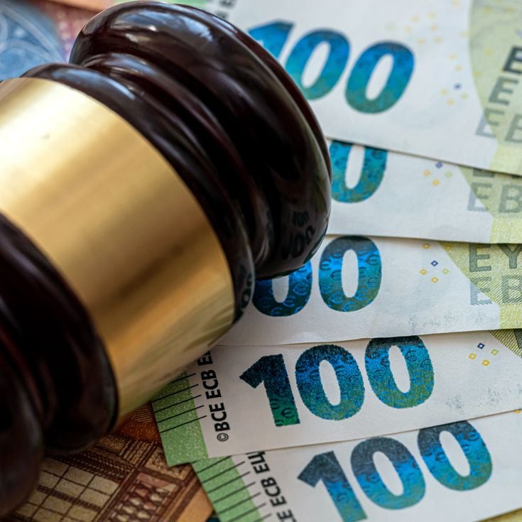 Judge's gavel on euro bills background. bribery or corruption concept RomanR - stock.adobe.com