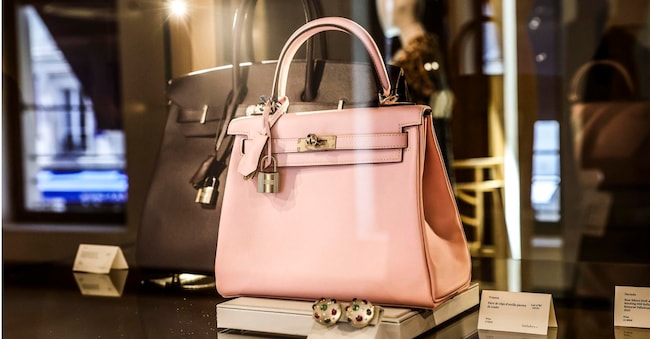 epa12210569 A pink Birkin bag by Hermes on display during a Fashion Icons auction at Sotheby's press preview in Paris, France, 02 July 2025. The Fashion Icons exhibition, showcasing the original 1984 Hermes Birkin bag and iconic creations from the 1950s-2010s by designers like McQueen, Dior, Balmain, Gaultier, Galliano, and Alaia, is open for the public from 03 to 09 July 2025 at Sotheby's in Paris. The Fashion Icons auction will be held on 10 July 2025. EPA/TERESA SUAREZ EPA
