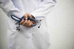 medical doctor with a stethoscope.