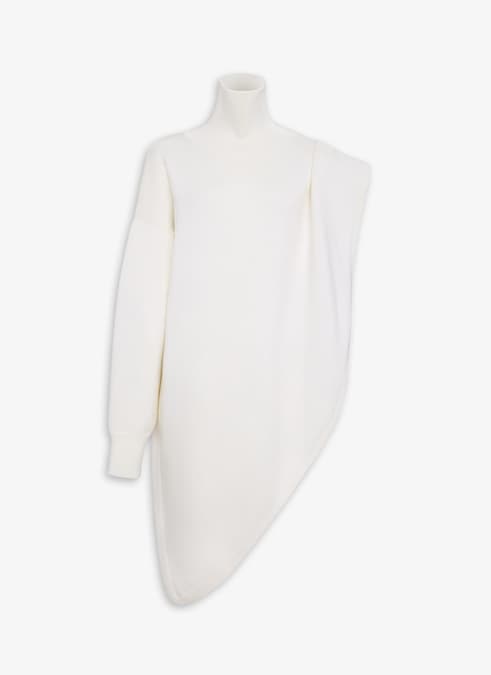 Alaïa. In lana maglia compatta, il pullover a mantella asimmetrico.