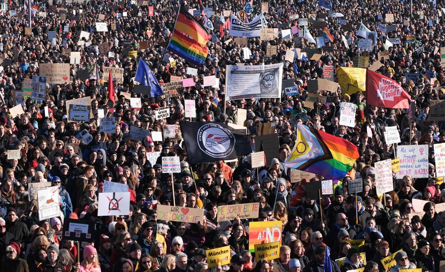 Protesters take part in a demonstration against the far right at the Theresienwiese under the motto “Democracy needs you!” in Munich, on February 8, 2025. New massive demonstrations against the far right took place on February 8, 2025 in Germany, including a very large mobilization in Munich with 200,000 people, according to the police in the Bavarian capital. (Photo by LUKAS BARTH-TUTTAS / AFP) (AFP)