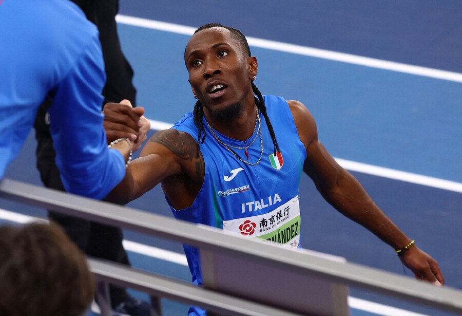Campionati mondiali di atletica indoor - Nanjing Youth Olympic Sports Park, Nanjing, Cina - 21 marzo 2025 L’italiano Andy Diaz Hernandez reagisce dopo aver vinto l’oro nel salto triplo maschile (REUTERS/Issei Kato) (REUTERS)