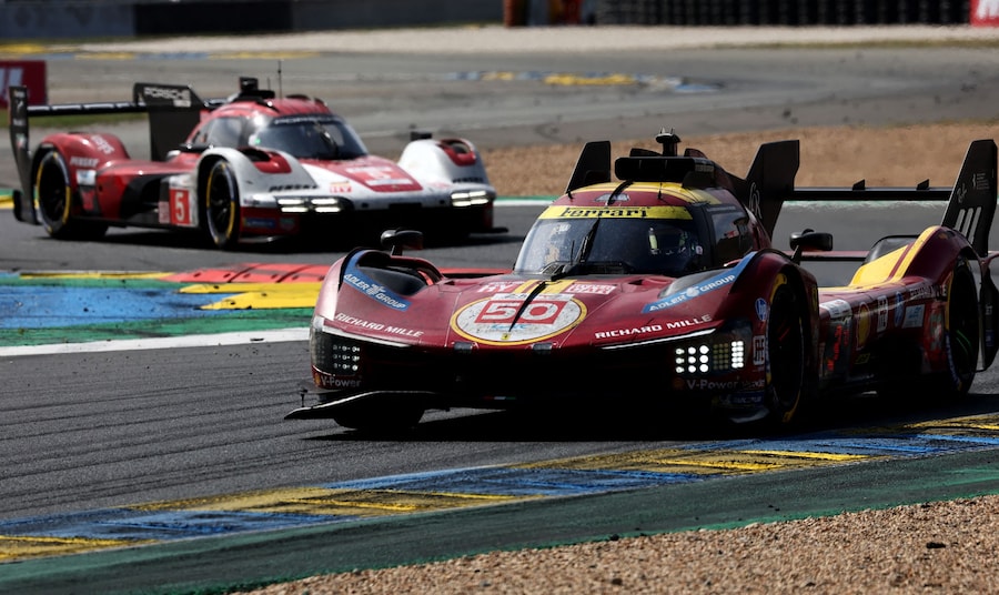 The 24 Hours of Le Mans - Circuit de la Sarthe, Le Mans, France - June 15, 2025 Ferrari AF Corse's Antonio Fuoco, Nicklas Nielsen, Miguel Molina and Porsche Penske Motorsport's Julien Andlauer, Michael Christensen and Mathieu Jaminet in action during the 24 Hours of Le Mans REUTERS/Stephane Mahe (REUTERS)