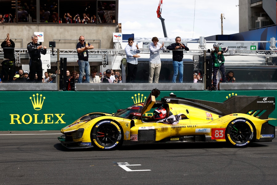 Robert Kubica of Poland in his AF Corse car a Ferrari 499P celebrates after crossing the finish line to win the 24-hour Le Mans endurance race, Sunday June 15, 2025 in Le Mans, western France. (AP Photo/Jeremias Gonzalez) Associated Press/LaPresse (APS)