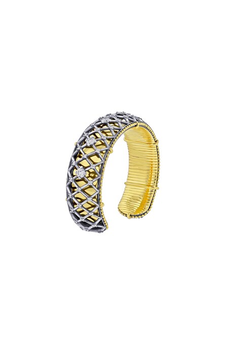 Elie Top. Manchette Resille Tourvel in oro giallo e argento anticato, con diamanti antichi incastonati su una rete sospesa specchiata nell’oro concavo