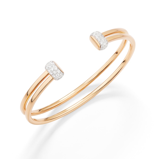 Pomellato. Bracciale rigido Together a doppia canna, arricchito da 50 diamanti bianchi al centro dell’unione