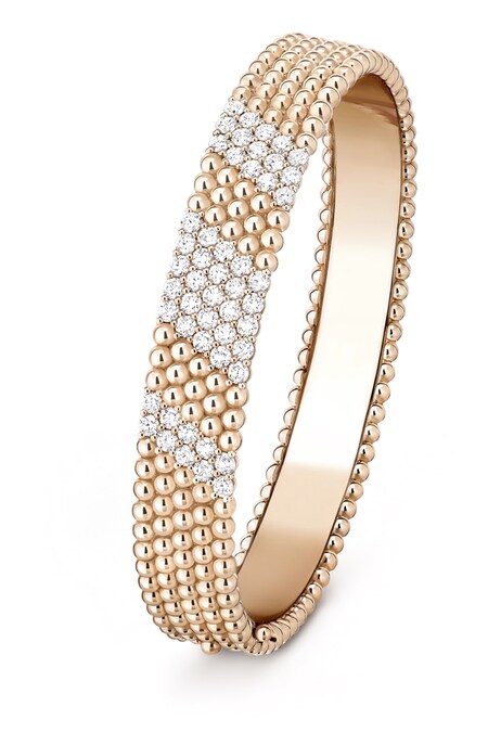 Van Cleef & Arpels. Bracciale Perlé e diamants, a 5 file in oro rosa e diamanti taglio rotondo, modello medio