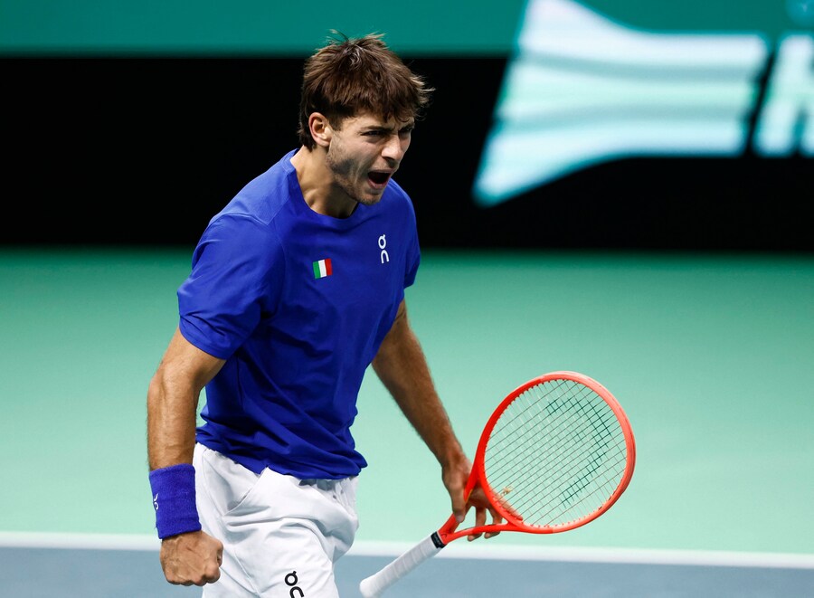 Tennis - Davis Cup - Final 8 - Final - Italy v Spain - SuperTennis Arena, Bologna, Italy - November 23, 2025 Italy's Flavio Cobolli reacts during his singles match against Spain's Jaume Munar REUTERS/Alessandro Garofalo (REUTERS)