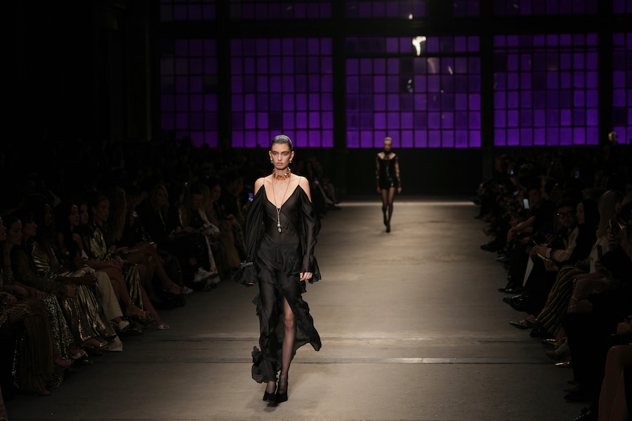 A model wears a creation from the Roberto Cavalli Fall/Winter 2026-2027 Women's collection presented in Milan, Italy, Thursday, Feb. 26, 2026. (AP Photo/Antonio Calanni) (APN)