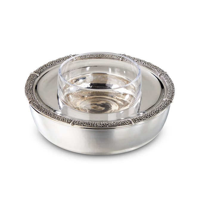 Ciotola per il caviale in argento e cristallo, BUCCELLATI (5.300 €).