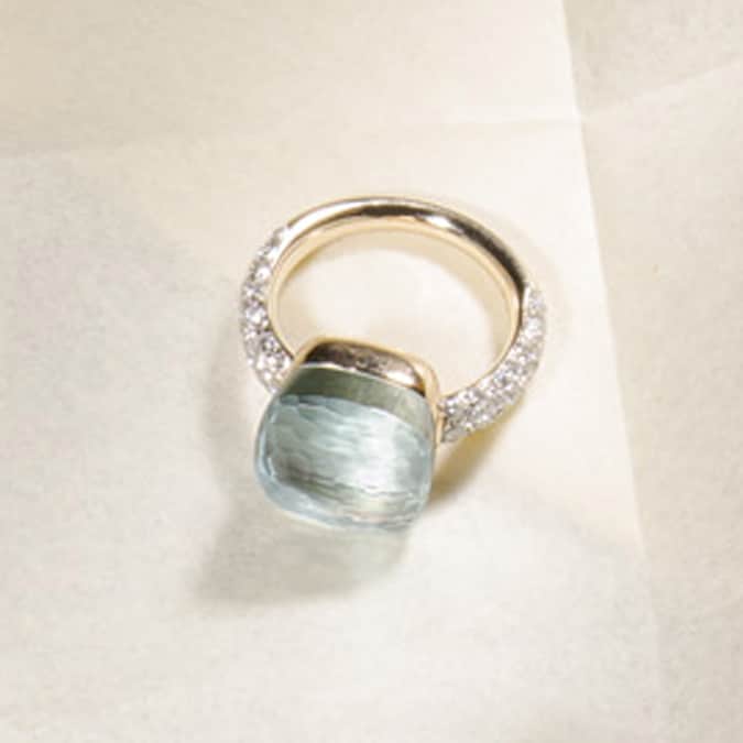 POMELLATO. Nudo, in oro bianco e rosa con topazio azzurro (circa 15 ct) e diamanti bianchi