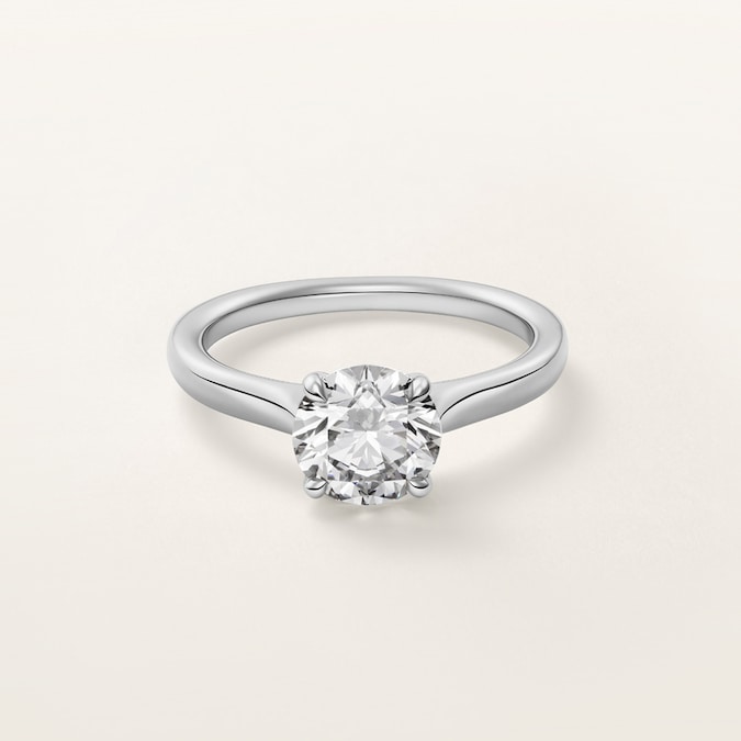CARTIER. Solitario 1895 in platino con diamante taglio brillante (pietre disponibili da 0,23 ct. in su)