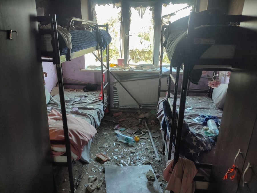 Rubble and shattered glass cover a room in a damaged dormitory building at the Starobilsk College of Luhansk Pedagogical University following a recent attack, what Russian-installed authorities called a Ukrainian drone strike, in the course of the Russia-Ukraine conflict in the town of Starobilsk (Starobelsk) in the Luhansk region, a Russian-controlled area of Ukraine, May 23, 2026. Picture taken with a mobile phone. REUTERS/Pavel Klimov (REUTERS)