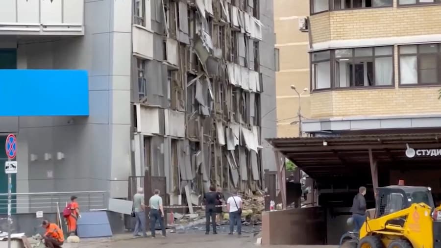 People gather near a residential building damaged during a drone attack, which local authorities said was an overnight Ukrainian strike, in the course of the Russia-Ukraine military conflict, in Krasnodar, Russia, in this still image taken from video footage released on June 11, 2026. Emergency response headquarters of Russia's Krasnodar region/Handout via REUTERS ATTENTION EDITORS - THIS IMAGE WAS PROVIDED BY A THIRD PARTY. NO RESALES. NO ARCHIVES. MANDATORY CREDIT. (via REUTERS)