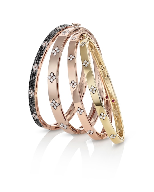 Roberto Coin. Bracciali rigidi in oro giallo o rosa, con brillanti bianchi e pavé di diamanti neri, Love in Verona Collection