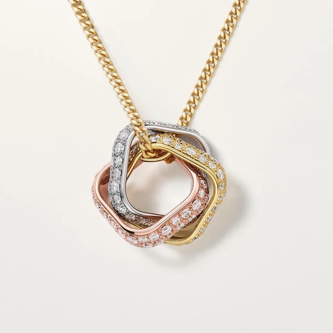 Cartier. Ciondolo Trinity, a forma cuscino, in oro bianco giallo e rosa con pavé di diamanti