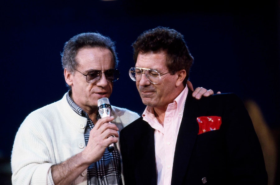 Anni' 90 - Peppino Di Capri, il famoso cantante italiano, durante uno dei suoi spettacoli con Johnny Dorelli. (LaPresse archivio storico)