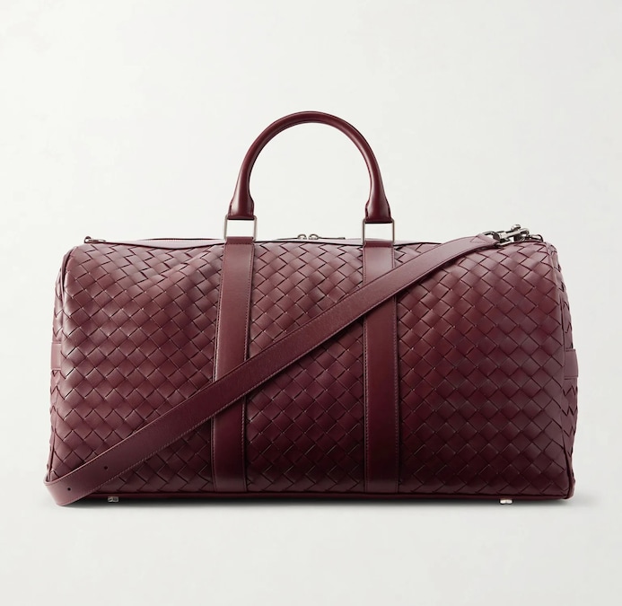 Bottega Veneta. Dimensione da cabina, in pelle con motivo Intrecciato e tracolla regolabile