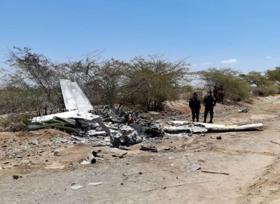 epa09728437 A handout photo made available by 2BM TV Nasca, shows the remains of the plane that crashed in the Ica region, Peru, 04 February 2022. At least seven people, including several tourists, died after the plane they were traveling in crashed when trying to land after touring the famous Nazca lines, in the Ica region, in southern Peru, local media reported. EPA/2BM TV NASCA / HANDOUT MANDATORY CREDIT / BEST QUALITY AVAILABLE HANDOUT EDITORIAL USE ONLY/NO SALES (EPA)
