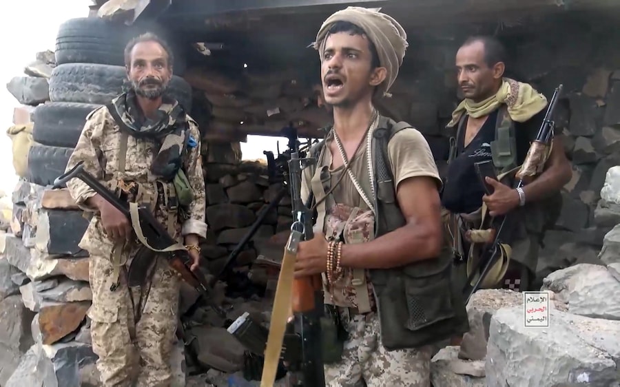 epa13237566 A screen grab taken from an undated handout video released on 13 September 2026 by the Houthi military media center shows Houthi fighters standing guard at a seized camp during an offensive in the port city of Mokha, western coast of Yemen. Yemen's Saudi-backed government accused Iran and its regional allies of supporting the Houthis’ recent offensive, during which the group captured key port areas, including Mokha, and seized control of strategic maritime positions along the Bab al-Mandab Strait. EPA/HOUTHI MILITARY MEDIA CENTER HANDOUT HANDOUT EDITORIAL USE ONLY/NO SALES (EPA)