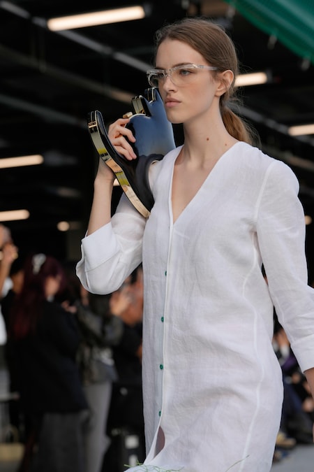 A model wears a creation part of the Moschino women's Spring-Summer 2027 collection, presented in Milan, Italy, Friday, Sept. 25, 2026. (AP Photo/Luca Bruno) (APN)