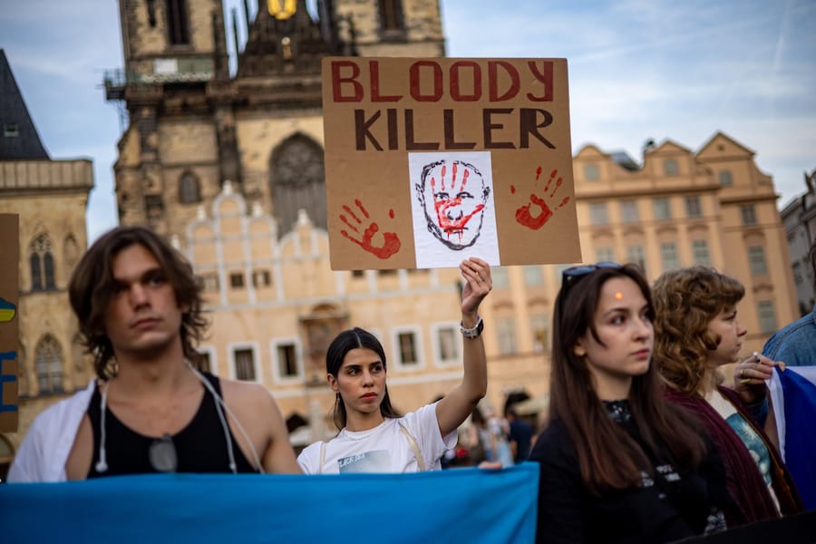 epa13275184 People gather to mark the Day of Defenders of Ukraine at Old Town Square in Prague, Czechia, 01 October 2026. The gathering was held to thank Ukrainian soldiers and highlight the need for continued military support for Ukraine. Among those attending were Ukrainian soldiers from the 39th Separate Unmanned Systems Battalion, who brought part of a Ukrainian flag damaged by Russian drones in Kramatorsk. EPA/MARTIN DIVISEK (EPA)