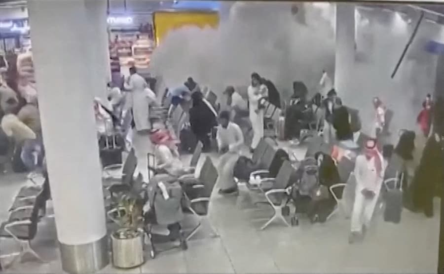 CCTV footage shows people reacting to an attack on Abha International Airport, in Abha, Asir Province, Saudi Arabia, in this screengrab from a handout video released October 15, 2026. SAUDI TV/Handout via REUTERS THIS IMAGE HAS BEEN SUPPLIED BY A THIRD PARTY VERIFICATION Reuters verified the video from the columns, planters and chairs, which matched archive imagery of the Abha International Airport. Coordinates: 18.234622, 42.657943. The date could not be independently verified. However, the Saudi General Authority of Civil Aviation reported an attack at Abha International Airport on October 6 and 7. The spokesperson of the Saudi-led coalition fighting Yemen's Houthi movement, Turki Al-Malki, said on Thursday (October 15) that the Houthis had attempted to attack dozens of airports in Saudi Arabia. No older versions were found posted online before October 15, when the footage was officially released during a Saudi-led coalition press conference. (via REUTERS)