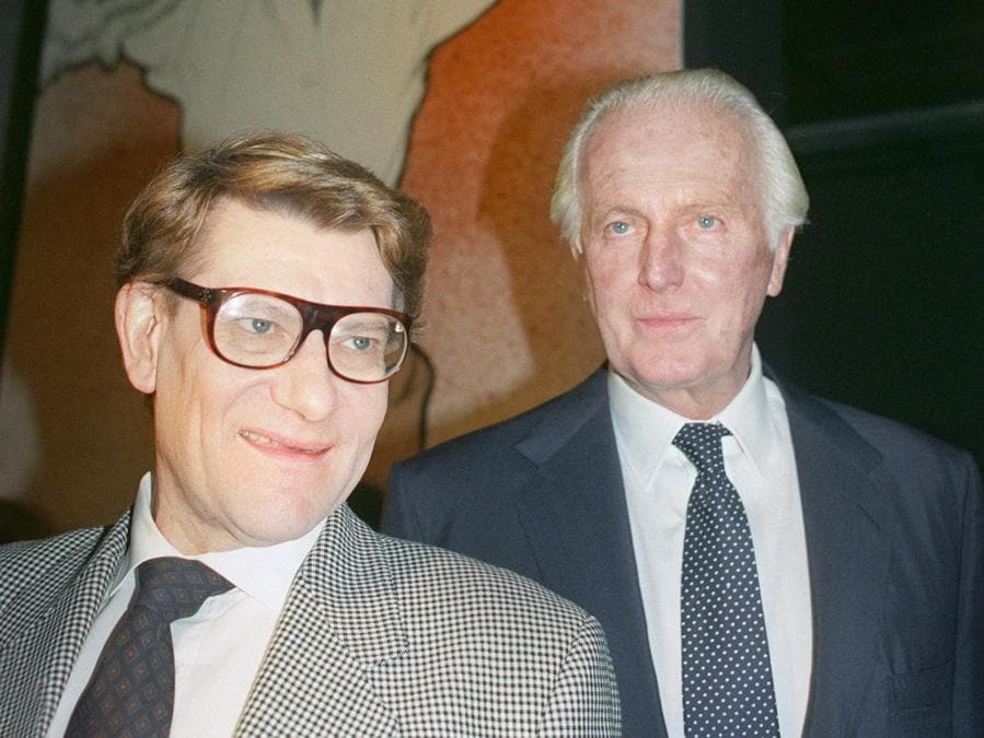 1991 - Con Yves Saint-Laurent (AFP PHOTO/PIERRE GUILLAUD)