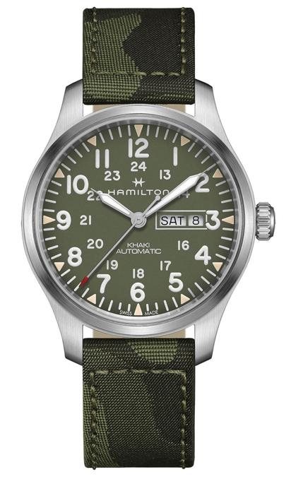 Hamilton. Look militare per il Khaki Field Camouflage. Il verde del quadrante richiama la stessa tonalità del cinturino camouflage con retro in morbida pelle e parte superiore in nylon liscio stampato. Cassa di 42 mm in acciaio e movimento automatico H-30. Prezzo 745 euro