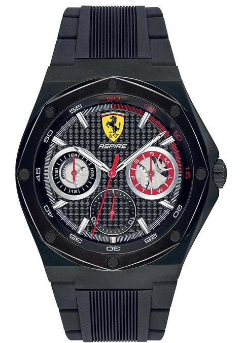 Scuderia Ferrari. Il mito del Cavallino Rampante rivive su questo orologio multifunzione caratterizzato da cassa di 42 mm in acciaio IP nero satinato. Quadrante nero con texture knurling e scudetto a ore 12. Impermeabile fino a 50 metri. Prezzo: 245 euro