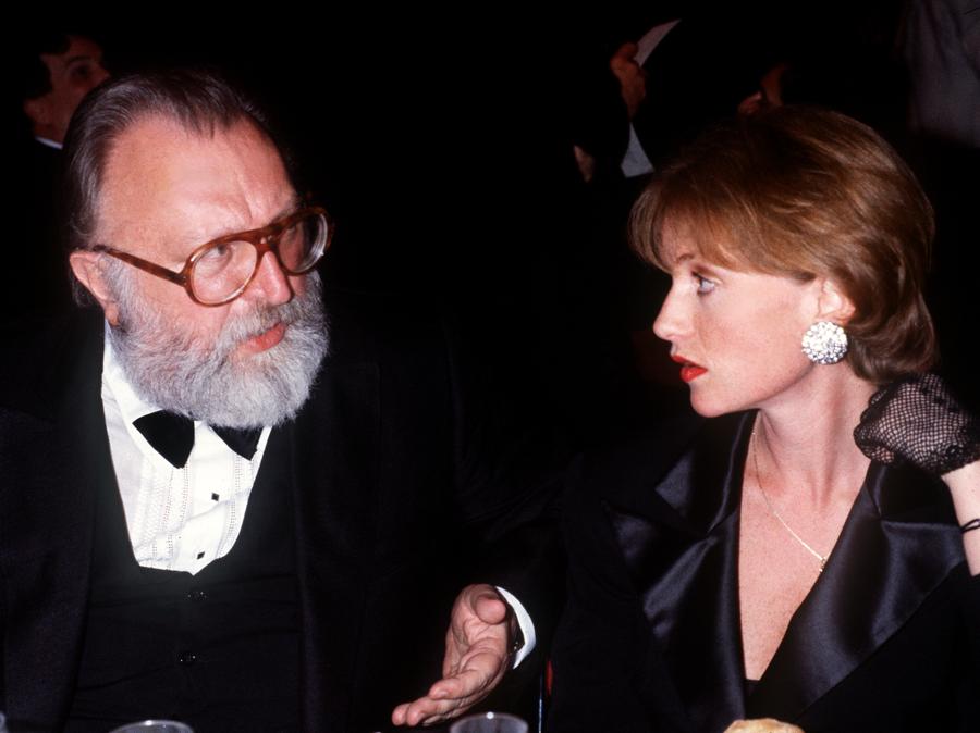 Isabelle Huppert e Sergio Leone. (Photo by RALPH GATTI / AFP)