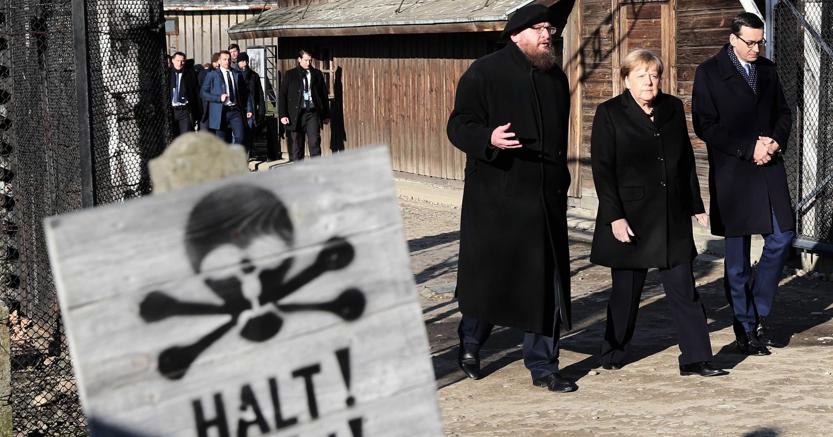 Prima Visita Di Merkel Ad Auschwitz Il Sole 24 Ore