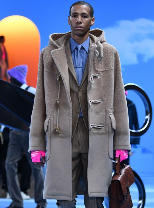 A model presents a creation by Louis Vuitton, during the men's Fall/Winter 2020/2021 collection fashion show in Paris on January 16, 2020. (Photo by Anne-Christine POUJOULAT / AFP)