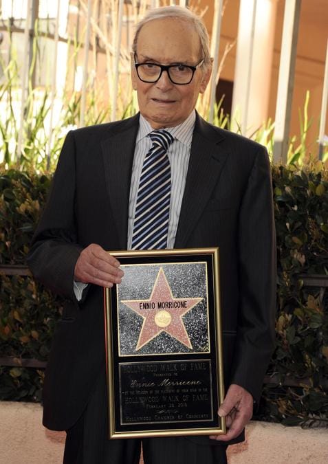  Hollywood, Ennio Morricone posa con la sua stella durante la cerimonia per la posa della stessa nella Hollywood Walk of Fame (EPA/PAUL BUCK)52612318
