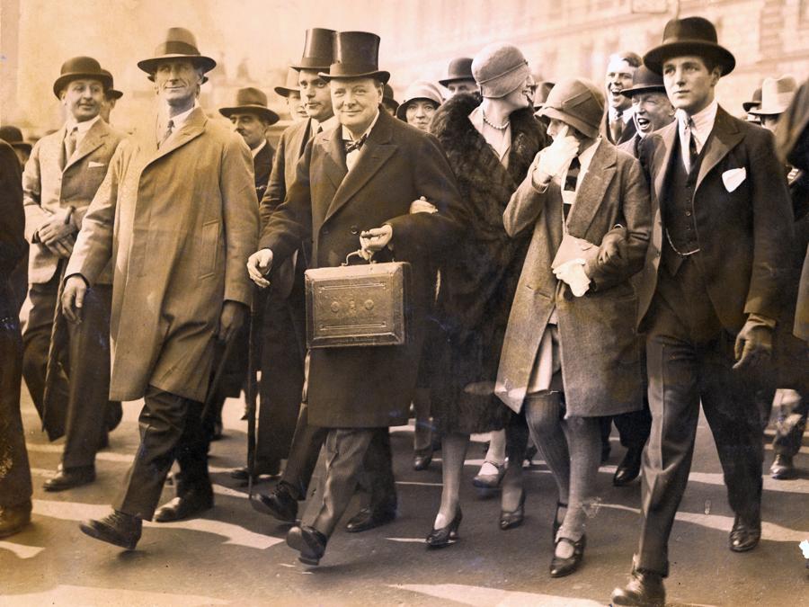 Winston Churchill, Chancellor of the Exchequer, carries the dispatch box on his way to the House of Commons, in London, to present the budget, April 29, 1929. Photo Credit Bettman Getty