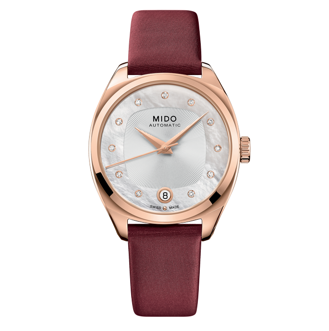 Mido. Se il cuore pulsante del Belluna Royal Milady è un movimento svizzero automatico, l'ispirazione dello stile e del design per la cassa in acciaio pvd oro rosa e per il quadrante (la cui parte centrale è decorata a guilloche e quella esterna è in madreperla con diamanti come indici) arriva direttamente dal Regno Unito. In particolar modo dalla tondeggiante Royal Albert Hall di Londra, mitico palcoscenico di tanti concerti, dalla celebre cupola di vetro