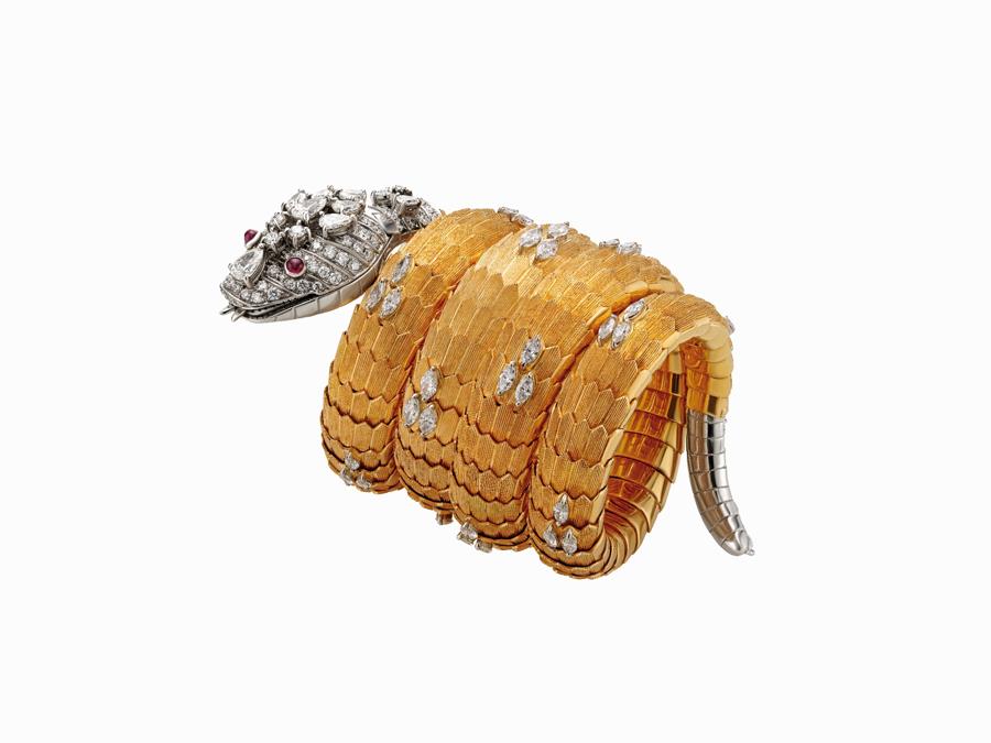 Bracciale Orologio Serpenti Bvlgari in oro e platino con rubini e diamanti 1966 Collezione Privata