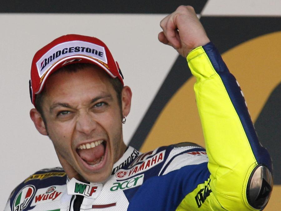 Valentino Rossi  festeggia dopo aver terminato al secondo posto il Gran Premio di Spagna a Jerez, 30 marzo 2008 (REUTERS/Javier Barbancho)