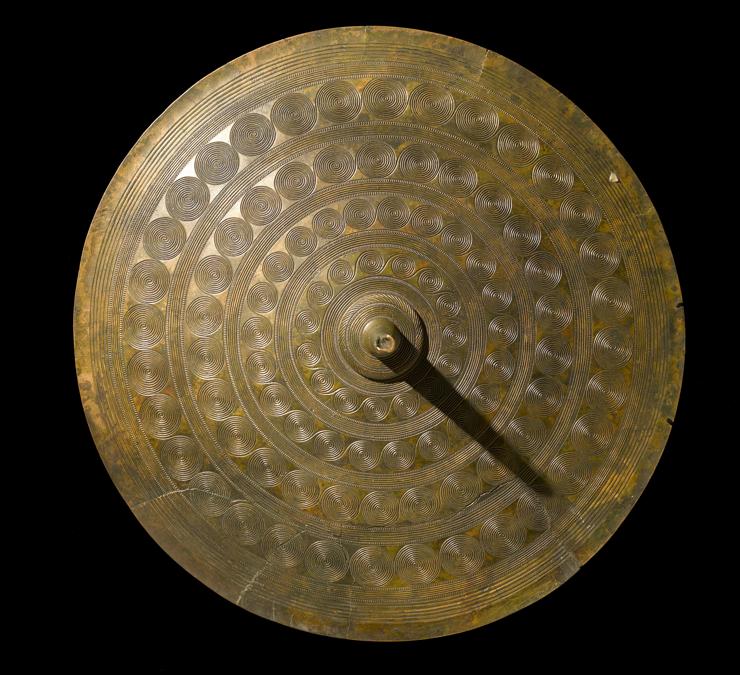 Decorated sun-disc from a woman's belt, c. 1400 BC Langstrup, Frederiksborg Amt and Vellinge, Fyn, Denmark. CC-BY-SA, Roberto Fortuna & Kira Ursem, National Museum of Denmark