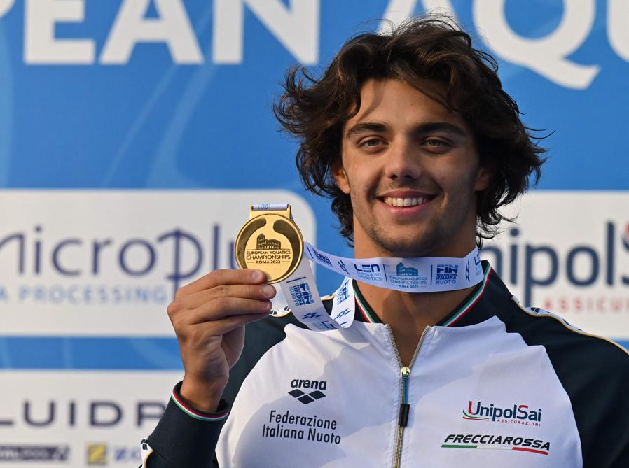 17 agosto - Thomas Ceccon - oro - 100m dorso maschile. (Photo by Alberto Pizzoli / AFP)