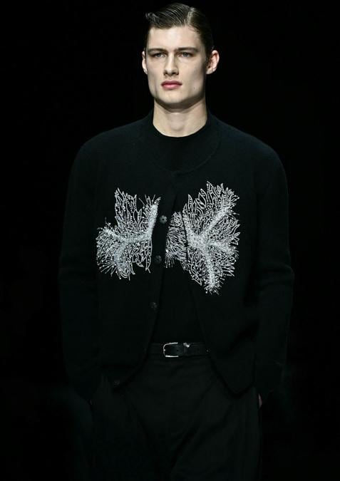 A model walks the runway at the Emporio Armani collection show during the Milan Fashion Week Menswear Autumn/Winter 2024/2025 on January 13, 2024 in Milan. (Photo by GABRIEL BOUYS / AFP)