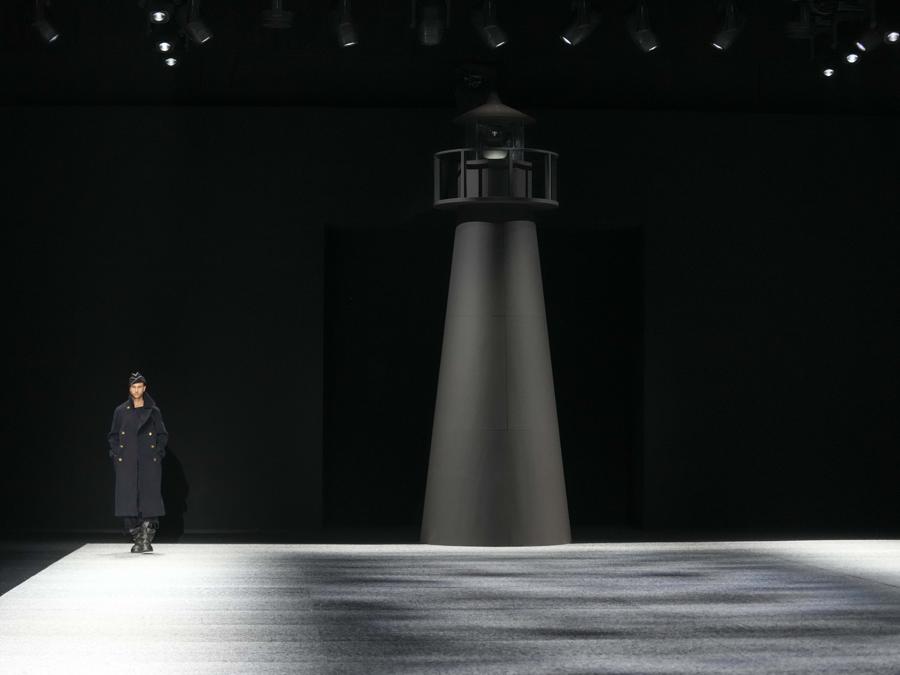A model wears a creation as part of the men's Giorgio Armani Fall-Winter 2024-2025 collection, that was presented in Milan, Italy, Saturday, Jan. 13, 2024. (AP Photo/Luca Bruno).
