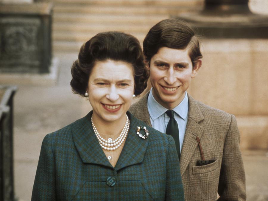 Queen Elizabeth II with Prince Charles at Windsor Castle, April 1969. (Photo by Fox Photos/Hulton Archive/Getty Images)