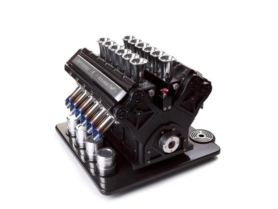 SuperVeloce, V8, V10, V12, macchine espresso speciali, solo su ordinazione, ispirate ai motori della Formula 1, con dispenser di grappa italiana, realizzate in materiali pregiati, a mano, con finiture e soluzioni hi-tech tratte direttamente da quelle aerospaziali. In rosso, blu, arancio, metallo canna di fucile, oro e nero. Eroga un caffè personalizzato di eccezionale qualità. Prezzo a richiesta. Da vedere il sito, è unico: www.superveloce.co